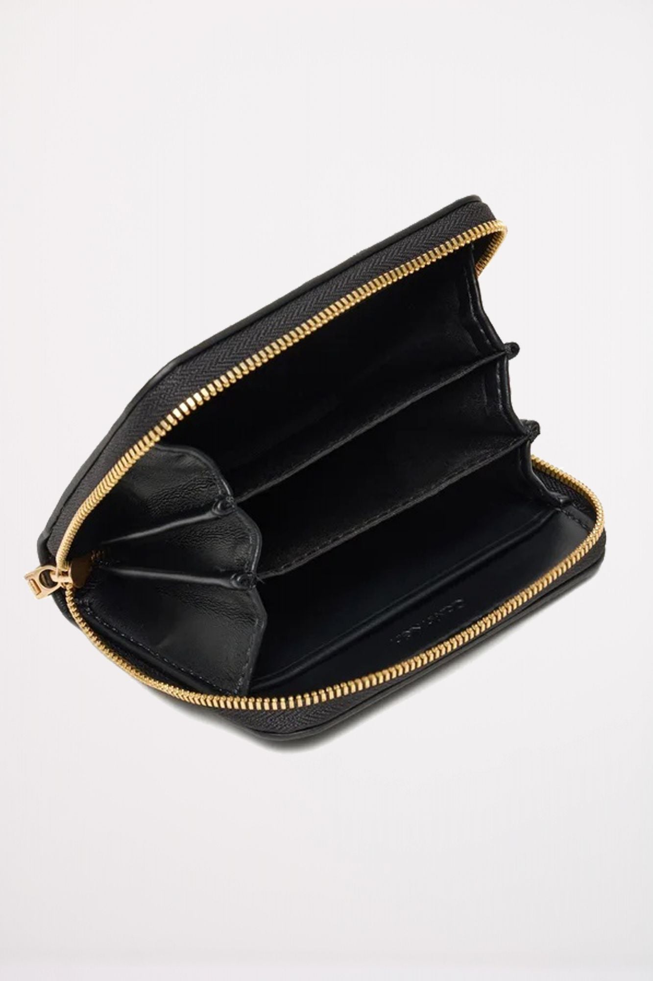 CALVIN KLEIN RAISED CK MEDIUM ZIP ARO en color NEGRO (3)