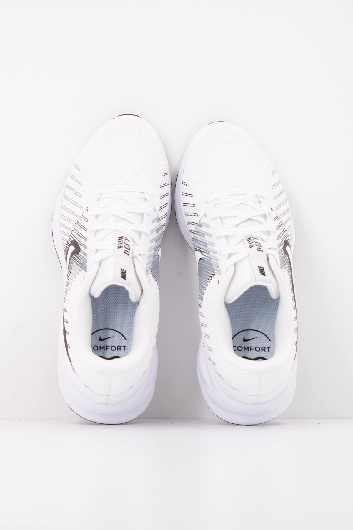 NIKE W NIKE RUN DEFY en color BLANCO (3)